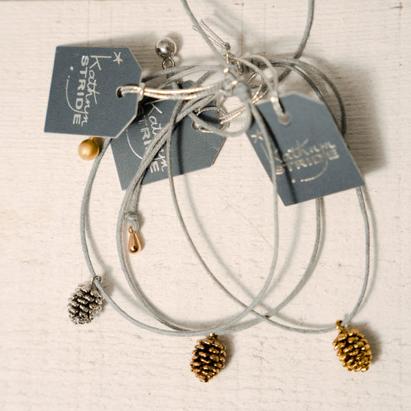 Grey cord Bracelet with Gold Pine Cone metal charm