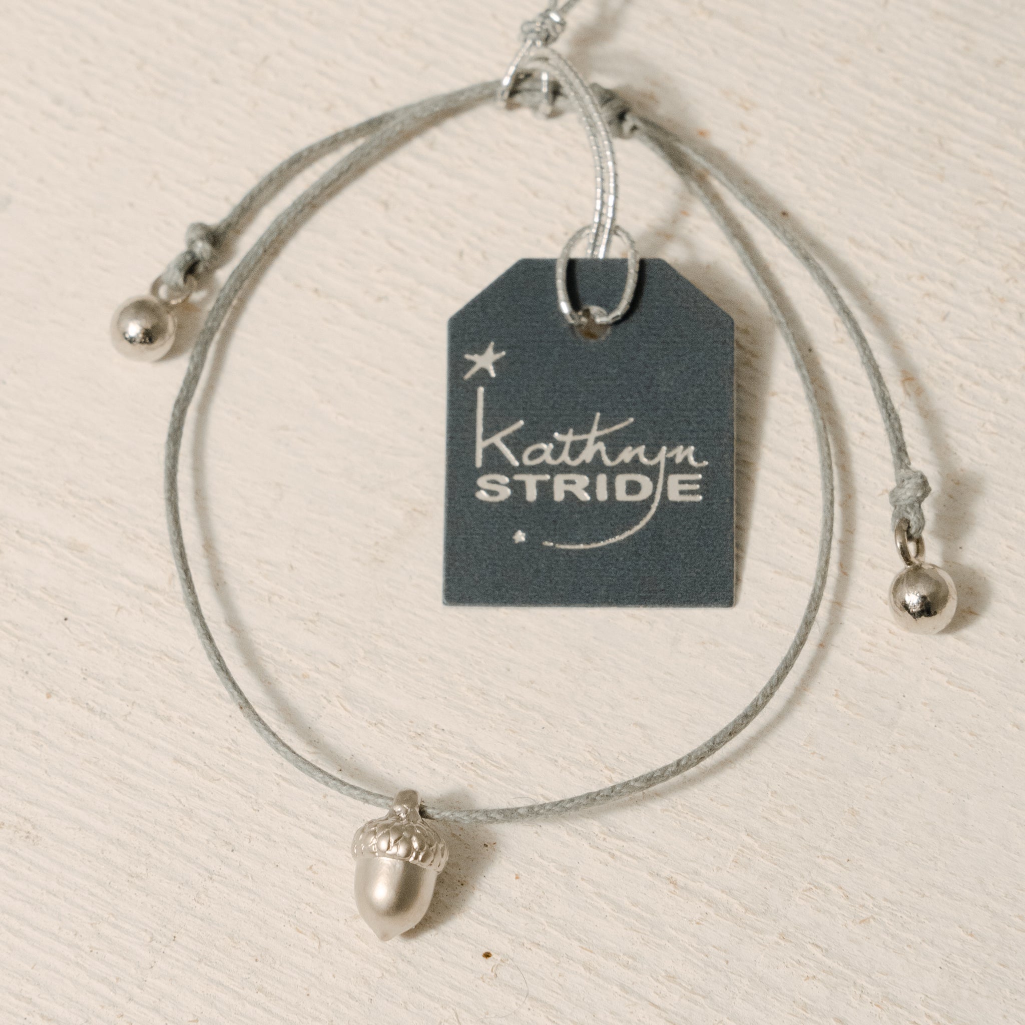 Grey cord Bracelet with Silver Acorn metal charm