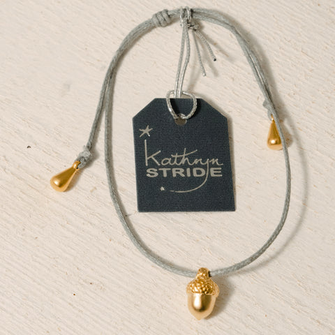 Grey cord Bracelet with Gold Acorn metal charm