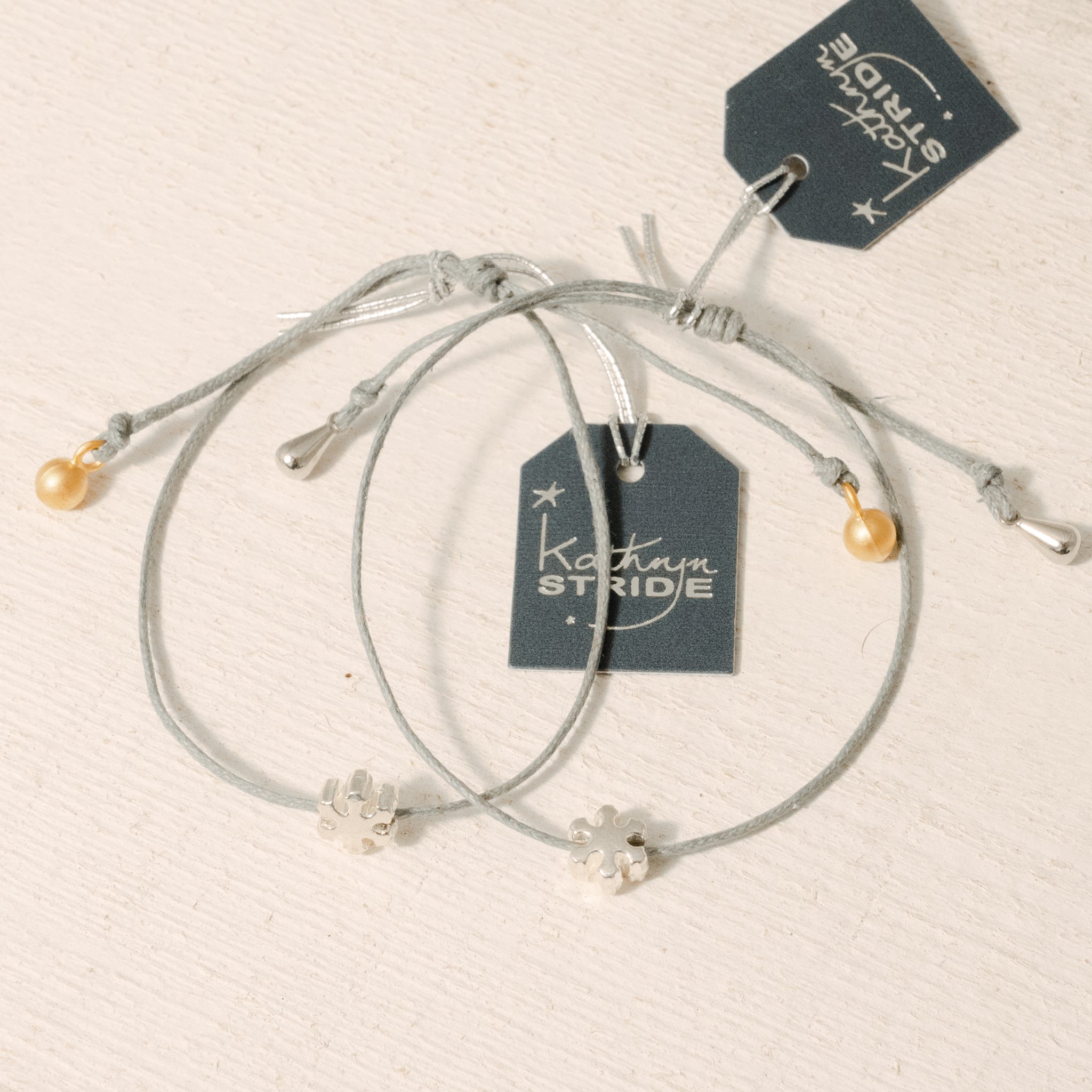 Grey cord Bracelet with Silver Snowflake metal charm