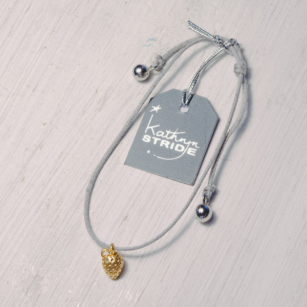 Grey cord Bracelet with Strawberry metal charm